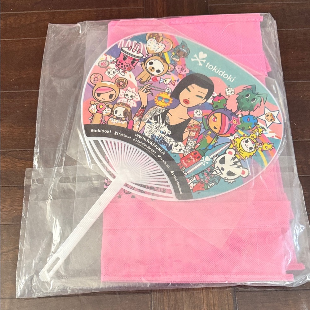 Tokidoki Multicolor Hand Fan with exclusive pink bag. Still in package.